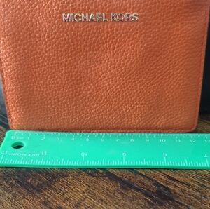 Michael Kors Orange Pebbled Leather Card Case with Silver Logo